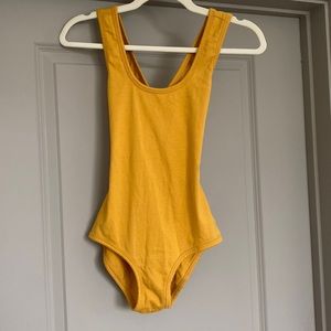 ARQ Cleo Leo yellow bodysuit